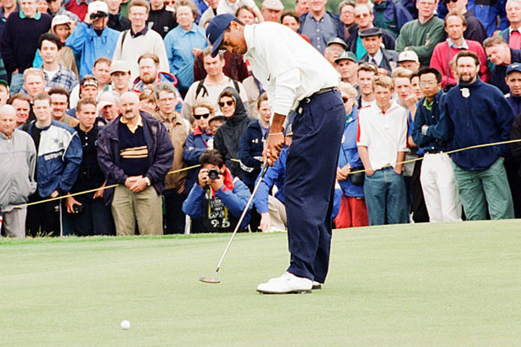Tiger Woods putting during his first experience of The Open, at Royal Troon in 1997